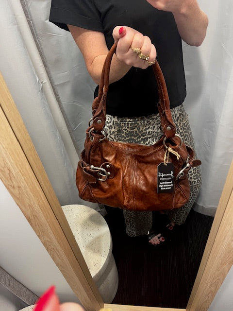rustic deep tan leather handbag