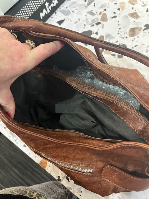 rustic deep tan leather handbag