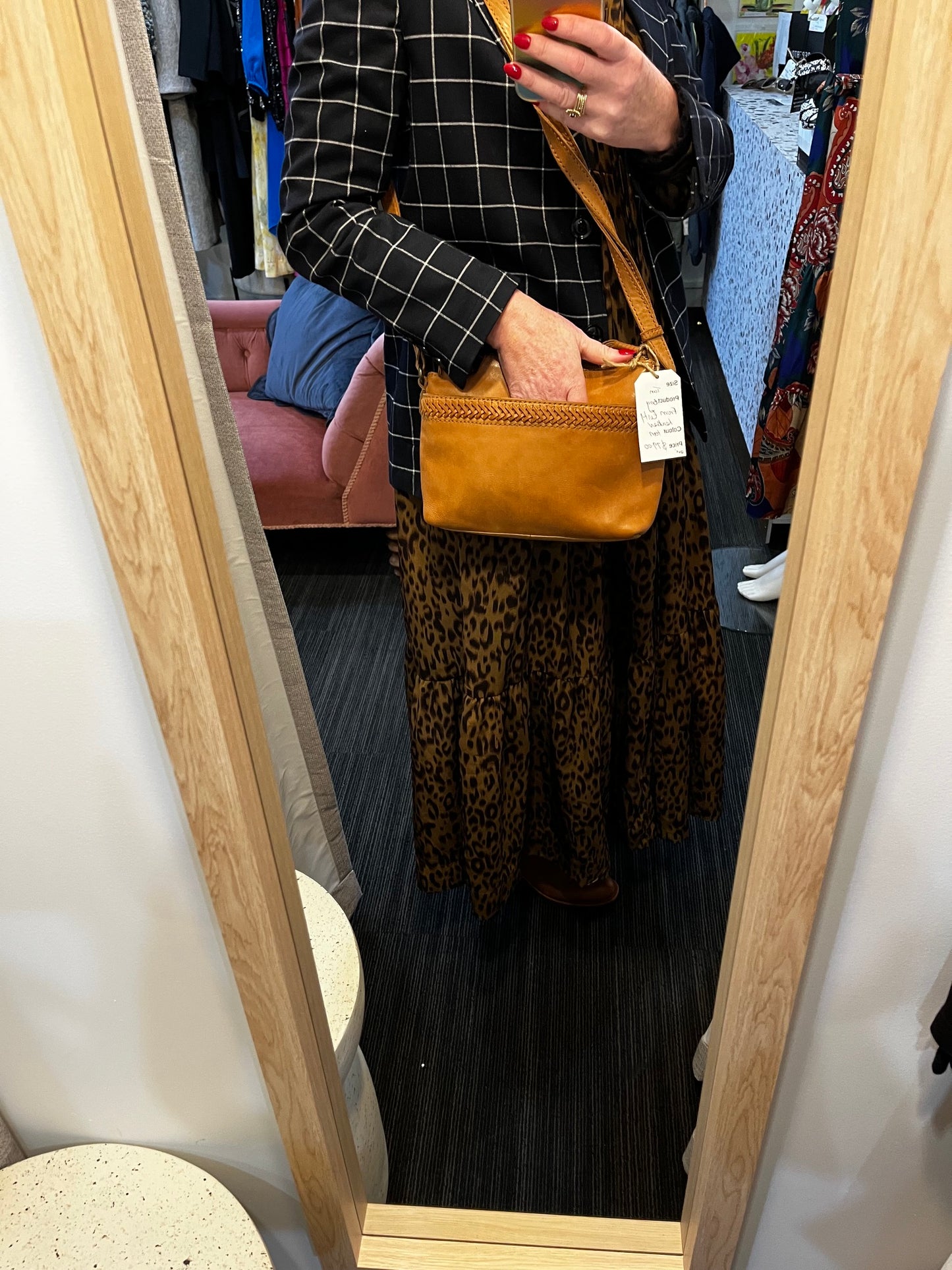 Evity leather side hung bag tan